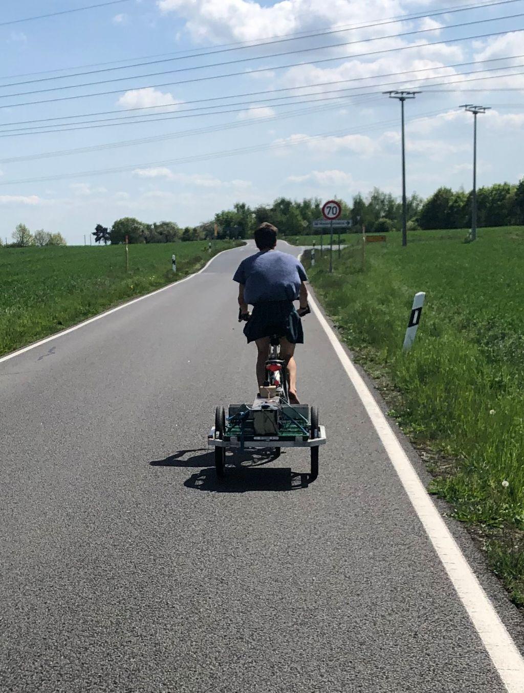 Me on the bike, with the trap in tow