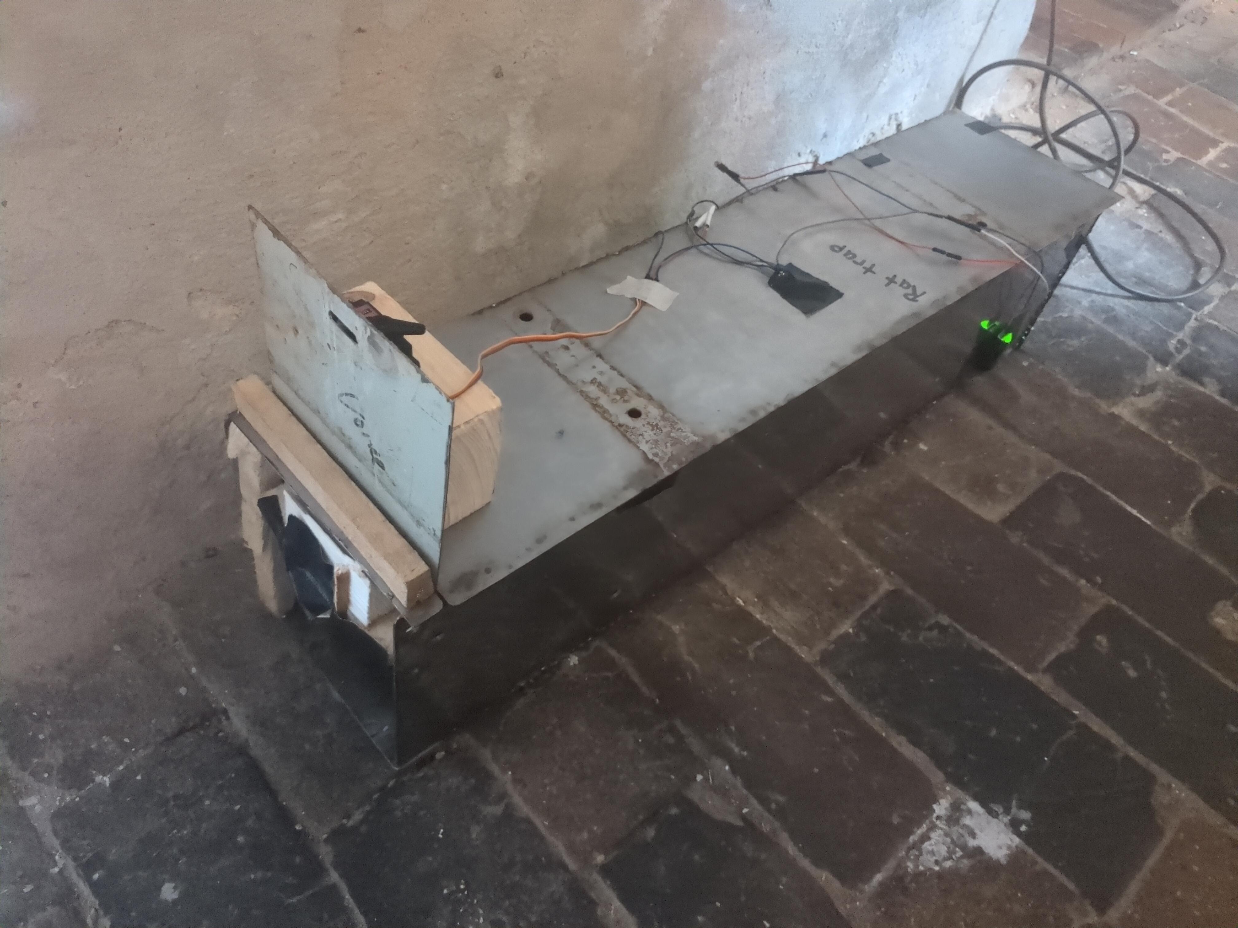The rattrap is a large flashing steel cuboid