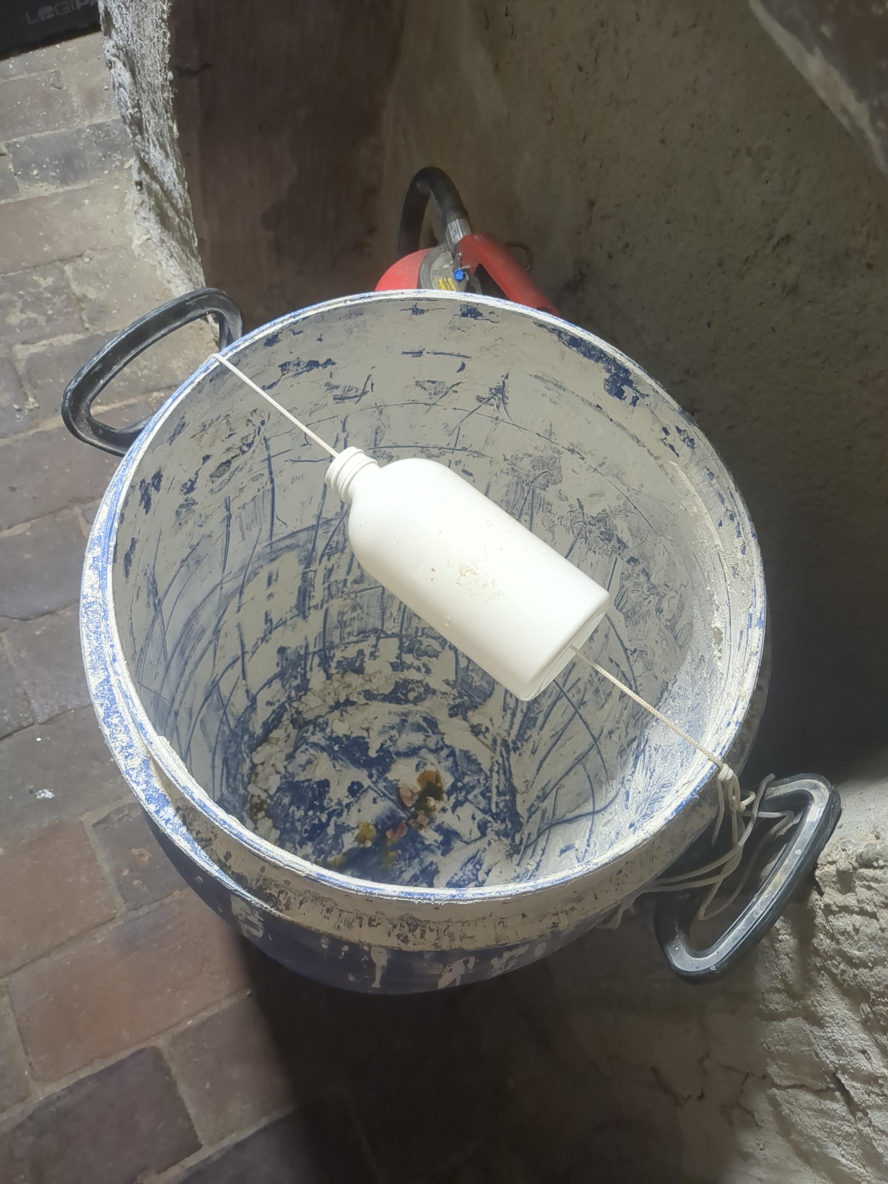 The second version with an empty bottle